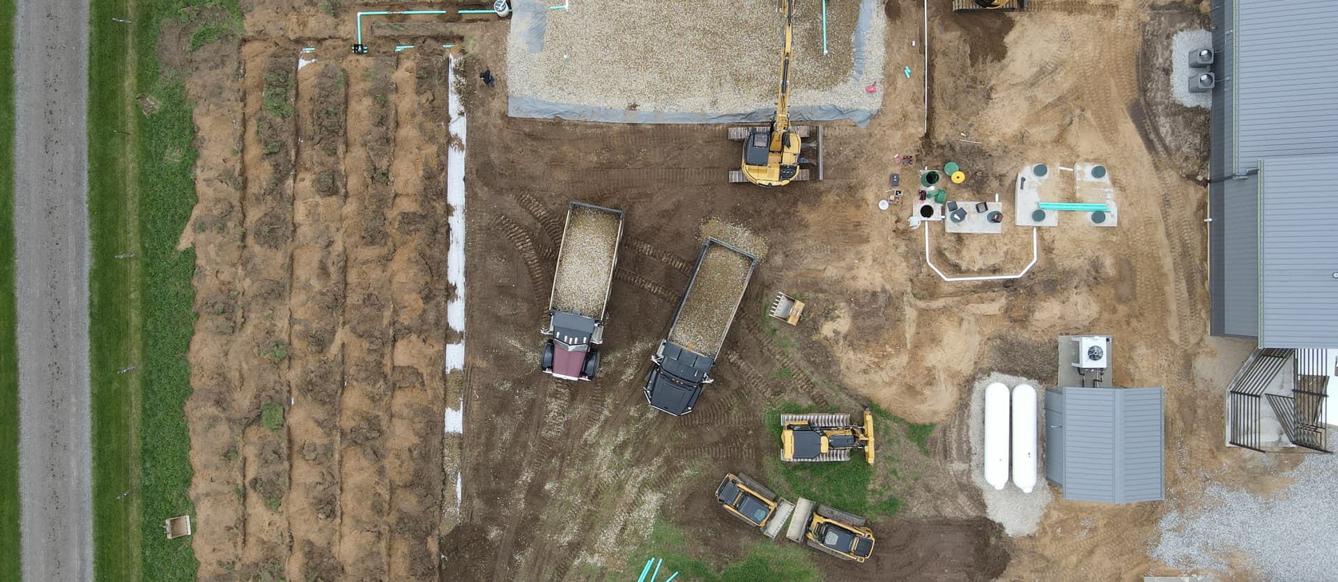 Aerial worksite, trucks and equipment
